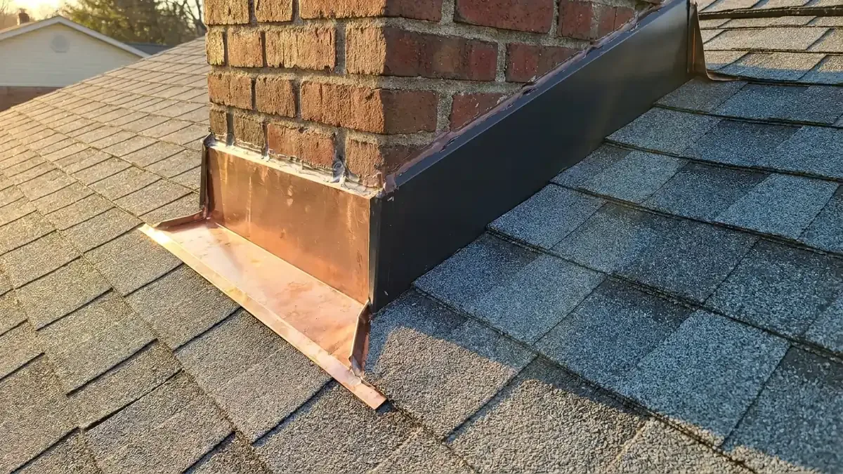 Chimney flashing and roof shingles